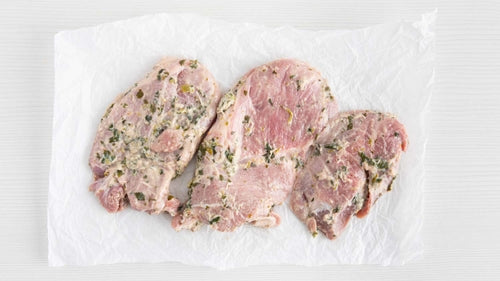 Boneless pork chops marinated in yogurt