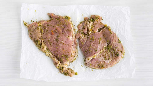 Boneless pork chops in a chimichurri marinade